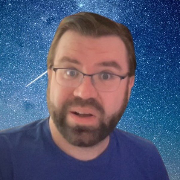 A photo of Sean looking surprised in front of a starry background