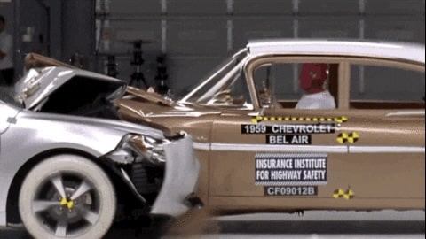 A still of a test car crash between older and newer car models.