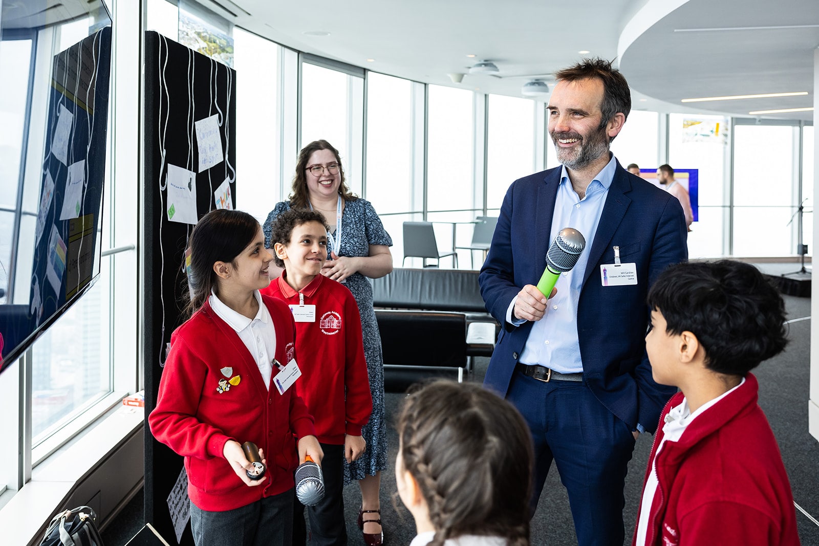 Students talking with an interviewer.